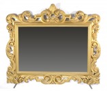 MIRROR IN A CARVED FRAME []